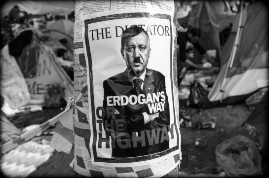 A frequent characterization; Gezi Square, Mid-June, 2013.  To use New York terms of reference, a caricature as a cross between an end-of-career Robert Moses, a Watergate-era Richard Nixon, and Rudi Giuliani at the time of the fly-specked Virgin Mary affair might be more charitable. (Fuji X100). To enlarge, click on image.