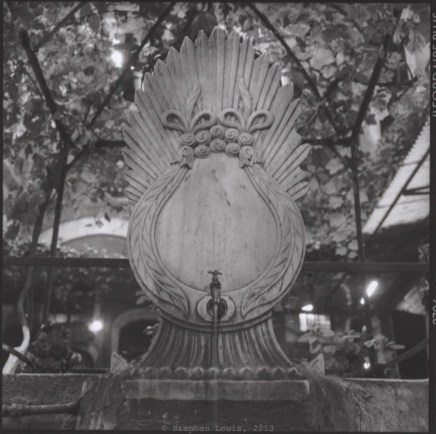 Fountain, seemingly from late-18th-century spolia, Zincirli Han, Kapalı Çarşıı, Istanbul, ca. 2000. (Rolleiflex Xenotar 2.8, Ilford XP2, scan of print.) Click to enlarge.