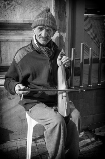 Keman player, istiklal Caddesi, Istanbul, 2012. Fuji X100. Click on image to enlarge.