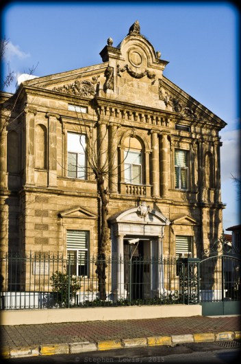 Main entrance section of the original building of Or Ahayim Hastanesi, the Balat Jewish Hospital, Balat, Istanbul, 2013.  Inscriptions, extent and obliterated, on its facade give insight into realities of past and present-day Istanbul.  (Fuji X100) Click on image to enlarge.